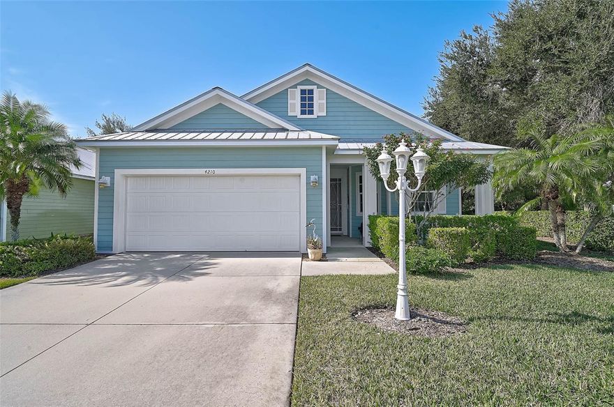 This beautifully maintained 2-bedroom, 2-bath home with a den/office is quietly nestled in a hidden cul-de-sac within the Cottages of Callista Village. Built in 2011, the home features high ceilings, abundant natural light, and an open floor plan that creates a bright and spacious living environment. Ideal for buyers relocating to Sarasota, first-time home buyers, or those looking to downsize, this property offers comfort, convenience, and a true Florida lifestyle.

The home includes hurricane-impact windows, ceiling fans in every room, and a private screened-in lanai overlooking lush, tranquil greenery. The open kitchen flows into a generous living and dining area, providing an excellent setting for both everyday living and entertaining. The main bedroom features three closets, including a large walk-in, along with an ensuite bathroom offering dual sinks and a separate walk-in shower. The second bedroom welcomes morning light, and there is also a den/office that can easily be converted to a third bedroom. A well-appointed laundry room with a deep sink leads into the oversized two-car garage, and a stand-up attic provides valuable additional storage.

Callista Village is a quiet, maintenance-free community of only 20 homes. This pet-friendly, age-friendly neighborhood sits adjacent to Longwood Park, offering access to pickleball courts, tennis courts, a dog park, baseball fields, and a playground. Its central Sarasota location places you within minutes of award-winning Gulf Coast beaches, downtown Sarasota’s arts and culture, Nathan Benderson Park, MoteSEA Aquarium, Whole Foods, Trader Joe’s, and The Mall at University Town Center.

This property is a rare Sarasota find, combining privacy, low-maintenance living, and proximity to top local amenities. A must-see for buyers seeking quality and convenience in a prime location.