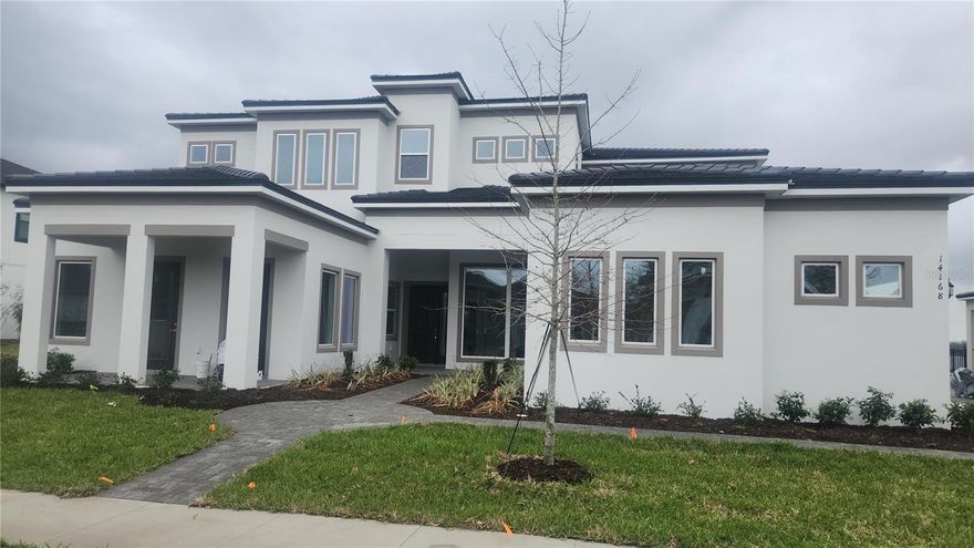 Exquisite Luxury Estate in Shorefront Cove at Horizon West. Presenting a rare opportunity to own a premier residence in the sought-after Shorefront Cove community of Winter Garden’s Horizon West. This elegant two-story estate offers 6,442 square feet of impeccably designed living space, showcasing refined luxury, modern convenience, and breathtaking views of Huckleberry Lake. Boasting 6 spacious bedrooms, 6 full bathrooms, and 2 half baths, this home features dual primary suites, one on the main level and one on the upper level, bonus room, wet bar, theater, large lanai, and 4-car garage offering ample storage and convenience. This residence provides easy access to major highways, premier shopping, dining, entertainment, and top-rated schools, all within one of Central Florida's most desirable communities.