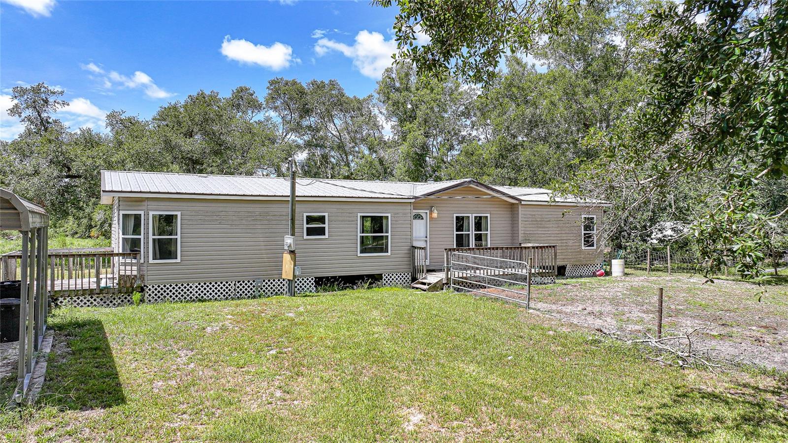 Looking for space, privacy, and the chance to make something your own? This three bedroom, two bathroom home sits on five gorgeous acres in DeSoto County and has all the makings of your country dream property. Inside, you’ll find a large floor plan, a supersized family room with fireplace, and a spacious primary suite with walk-in closet and big bathroom. It does need some TLC and updates, but that’s where the potential comes in. You can bring your own style and vision to life while building equity along the way. The property itself is the real star: a metal roof already in place, plus a barn, shed, and detached two-car carport for all your toys, tools, and ranch equipment. With five private acres, you’ll have the room to roam, play, and create the lifestyle you’ve been dreaming of. If you’ve been waiting for the perfect fixer-upper with great bones, space to spread out, and endless opportunity—this is your chance to snag your very own piece of DeSoto County paradise.