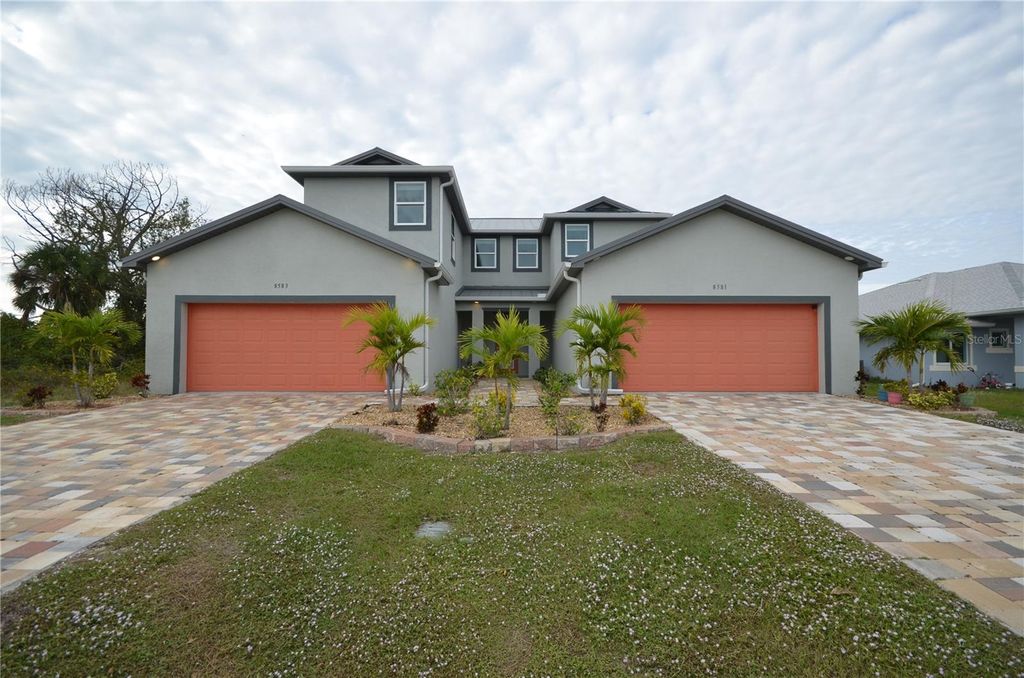 Photo of 8581 Agate Street, Port Charlotte, FL 33981 (MLS # O6327440)