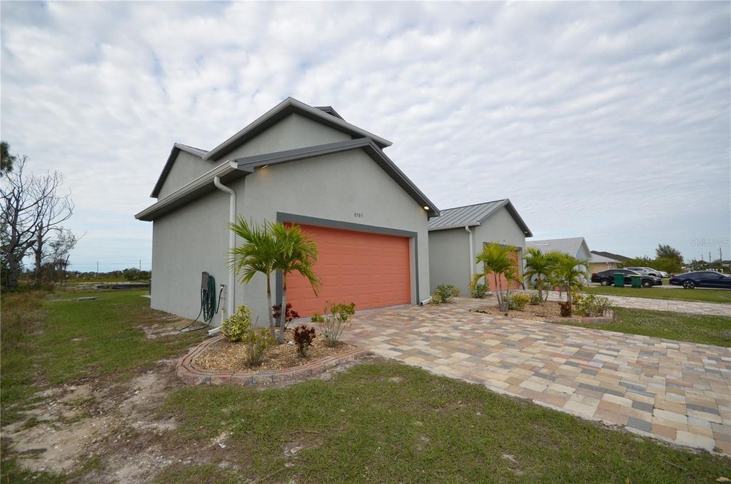 Photo of 8581 Agate Street, Port Charlotte, FL 33981 (MLS # O6327440)