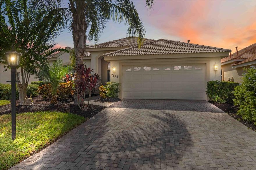 Welcome to your beautiful retreat at The Hamptons in Palmer Ranch, one of Sarasota’s most sought-after communities. NEW appliances, HVAC and pool cage! This lovely home offers convenient access to downtown Sarasota, world-famous Siesta Key Beach, premier shopping destinations, fine dining, and top-rated schools, with new HVAC and appliances it's a perfect blend of comfort, convenience, and lifestyle. As you arrive, the paved brick driveway and well-manicured lawn set the tone for what’s inside. The home is surrounded by lush, mature landscaping that enhances its inviting curb appeal. Step through the oversized foyer, and you’re welcomed by high ceilings and an abundance of natural light. The spacious living and dining rooms are perfect for entertaining or relaxing with family and friends. Tucked away for privacy, you’ll find two guest bedrooms, a full bath, and a laundry room—all designed with comfort and practicality in mind. At the heart of the home, the kitchen features ample cabinetry, a breakfast bar, and a casual dining area, flowing seamlessly into the cozy family room. Both spaces overlook the screened-in lanai and sparkling pool, framed by serene views of lush trees just beyond the backyard. It’s an ideal setting for morning coffee, evening cocktails, or weekend gatherings. The primary suite is a peaceful retreat, complete with sliding glass doors that open to the lanai and a spacious ensuite bathroom. High ceilings continue throughout, creating an open and airy feel. Just down the street, enjoy the community pool, and for those who love the outdoors, The Legacy Trail is only steps away—perfect for biking, jogging, or leisurely walks. Whether you’re looking to explore Sarasota’s vibrant cultural scene or relax in the privacy of your own oasis, this home offers the best of both worlds.