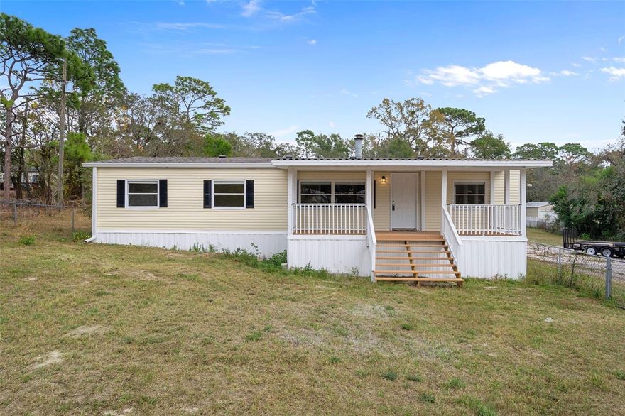 This stunning and gorgeous remodeled home is like having a brand new home with all the upgrades on 1.25 beautiful acres !!  The home features a new A/C, new roof, new electrical panel and all new electrical receptables, new vinyl siding, new vapor barrier, new underskirting, new insulation and all new soffits. You have found the perfect country home that offers you an amazing blend of modern comforts and charming country living. Upon entering the home you are greeted by a spacious living room with gorgeous luxery vinyl plank flooring that flows throughout the entire home. The living room is perfect for family gatherings or quiet evenings in and features a charming wood burning fireplace that is surrounded by custom stone accents and beautiful custom made shelving and new cabinets. There is a spacious dining room thats perfect for all your family meals that flows seamlessly into the beautifully remodeled kitchen. This beautiful kitchen features brand new gorgeous cabinets, new double sink & faucet, new led recessed lighting and stainless steel appliances that create a chef's paradise. The master suite is a true retreat, boasting a spacious layout with a large walk-in closet. The elegant en-suite bathroom is beautifully remodeled and is equipped with brand new dual vanities with new sinks and faucets, gorgeous modern lighting, linen closet, new toilet and a brand new convient tub/shower combo with gorgeous glass shower doors. Each of the four spacious bedrooms are designed with comfort in mind, complete with beautiful new ceiling fans with lights and ample natural light. The guest bathroom also features a brand new tub-shower combo with gorgeous new glass shower doors, new toilet, new modern lighting and new vanity with a new sink and faucet ensuring convenience for both residents and guests alike. There is a practical inside laundry room, enhancing the overall functionality of the home. The Outdoor living space this home offers is equally inviting, with a wonderful front porch that serves as an ideal spot for morning coffee or evening relaxation. The property is fenced in completely with four foot fencing and complemented by a storage shed. Enjoy the peace and tranquility of country living while being conveniently located just 13 minutes from the suncost parkway (vetrans pkwy)  and 5 minutes to shopping, dining, schools and medical facilities. This mobile home truly embodies the perfect blend of comfort, style, and accessibility. Priced to sell quickly for only $339,900, make your appointment to this amazing home today !!