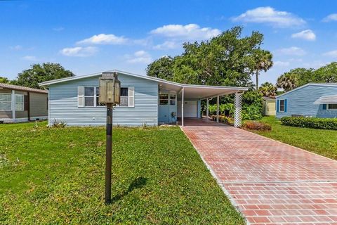 Photo of 316 Portside Lane, Edgewater, FL 32141 (MLS # NS1088441)