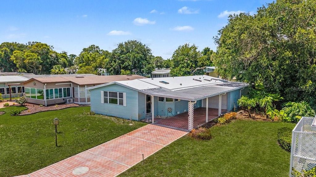 Photo of 316 Portside Lane, Edgewater, FL 32141 (MLS # NS1088441)