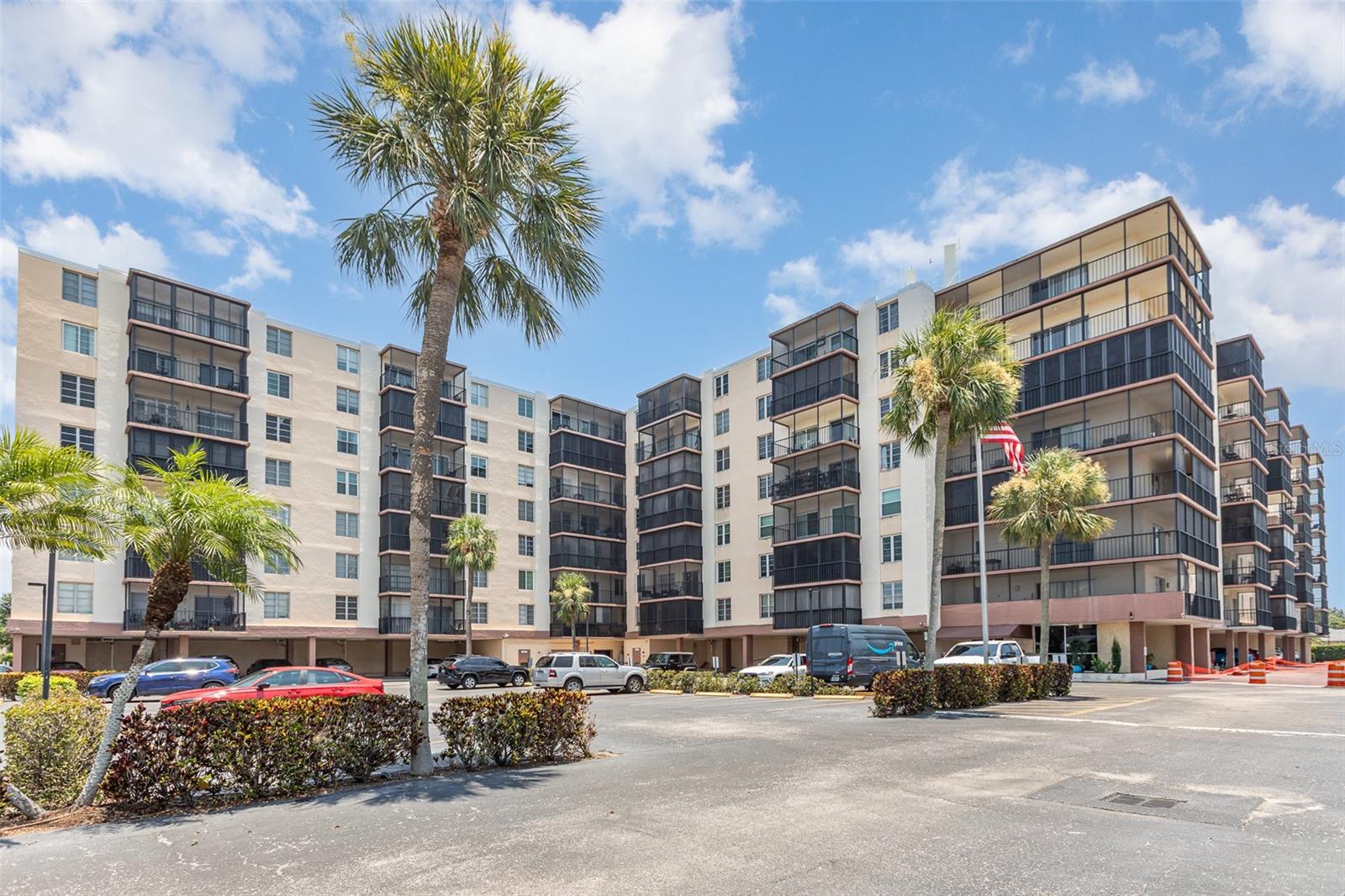 Top-Floor Condo with Lanai & Pool View – Move-In Ready - Welcome to this beautifully maintained condo located on the top floor of an 8-story secured building in desirable West Bradenton. Enjoy peaceful sunrises over the treetops from your spacious screened-in lanai with a relaxing pool view. Inside, the split floor plan offers both comfort and privacy. The primary bedroom features two closets, and one of the bathrooms was renovated in 2018 with updated flooring, a tile shower, and a modern vanity. Additional recent upgrades include a new air purification system (2025), a new tankless water heater (2025), and a 7-year-old AC system with all parts recently replaced. The building features secured access, laundry facilities just steps from the unit, and elevators updated in 2017. You'll also have extra storage and an assigned parking space. Community amenities include a heated pool, gas grills, patio furniture, a recreation room with a kitchen, fitness equipment, a library, and an on-site management office. Pets are allowed. This well-maintained condo offers low-maintenance living in a peaceful, amenity-rich setting.