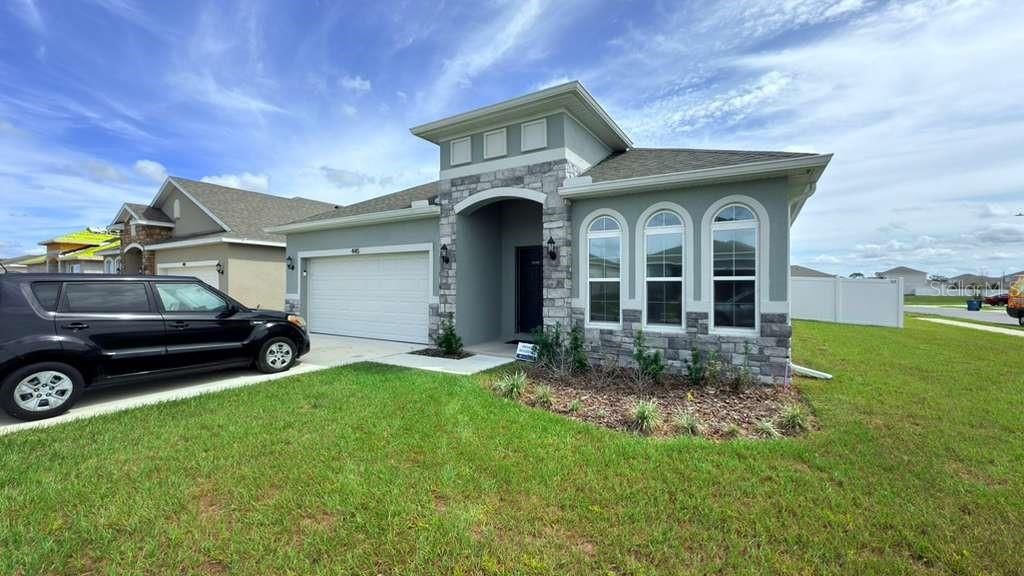 Photo of 445 Silver Palm Drive, Haines City, FL 33844 (MLS # S5139153)