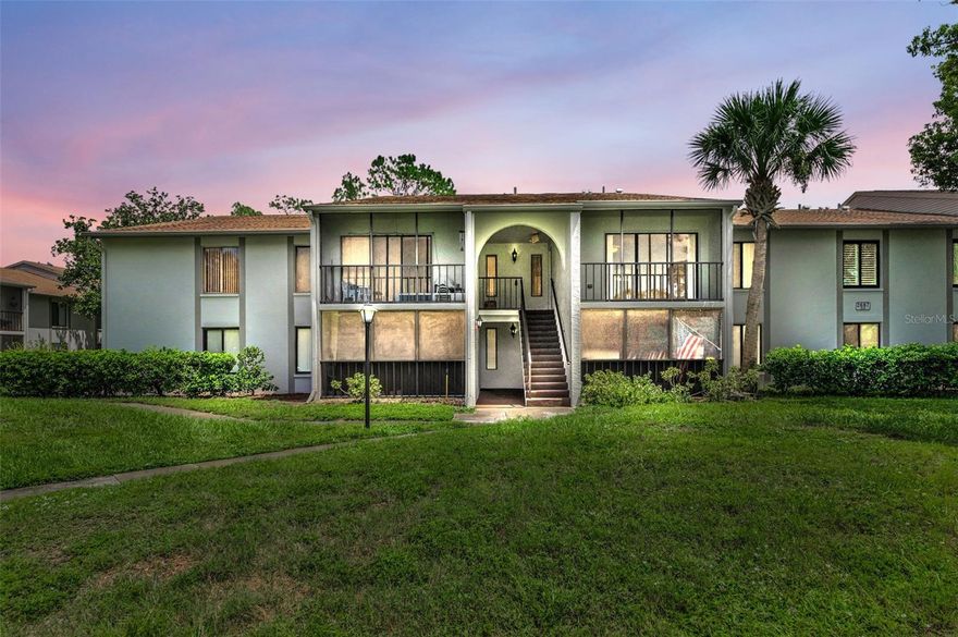 One or more photo(s) has been virtually staged. Welcome to Pine Ridge At Palm Harbor, a pet-friendly retirement community! This wonderful 2nd floor 1 bedrroom condominium features a large floorplan with 805 sqft (including the patio). Freshly painted and ready to move in as your primary residence, vacation home or investment property. No wait-time to rent as a new owner. Top floor, no neighbors above! And no carpeting! High-quality wood-look plank flooring throughout, including the bedroom and inside the large large walk-in closet which also has custom, built-in shelving. The kitchen has plenty of storage and the cabinets have updated, raised-panel doors. All appliances included. Sellers just installed a brand new water heater and new water shut off valve. The bathroom offers a bathtub with shower and dual access doors from both the hallway and the spacious bedroom. Large living area has slider doors that lead to an enclosed and screened pato. Convenient inside laundry closet located off of the tiled kitchen, washer/dryer included. BONUS: Buyer's have peace of mind; seller's are offiering a one year home warranty! Low HOA fees $334.06 include roof, cable, internet, sewer, trash, water, heated pool, heated spa, clubhouse, walking trails, grounds maintenance, an on-site manager and more. Pine Ridge is a great location nearby beaches, Honeymoon Island State Park, restaurants, shopping, medical and dental facilities. Call for your private in-person or live virtual tour today!
