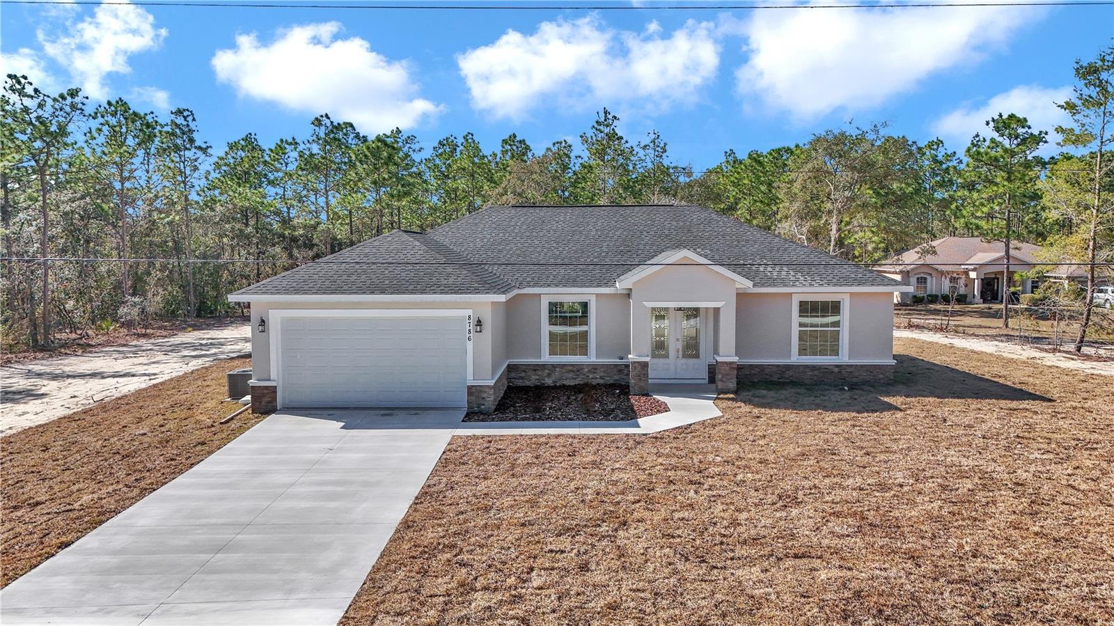 Brand new Construction ready to move within the next 30 days 3 bedroom 2 bathroom developed and built by Florida Dream Home Group. Secluded and quiet neighborhood on over 1 acre in Rolling Hills.