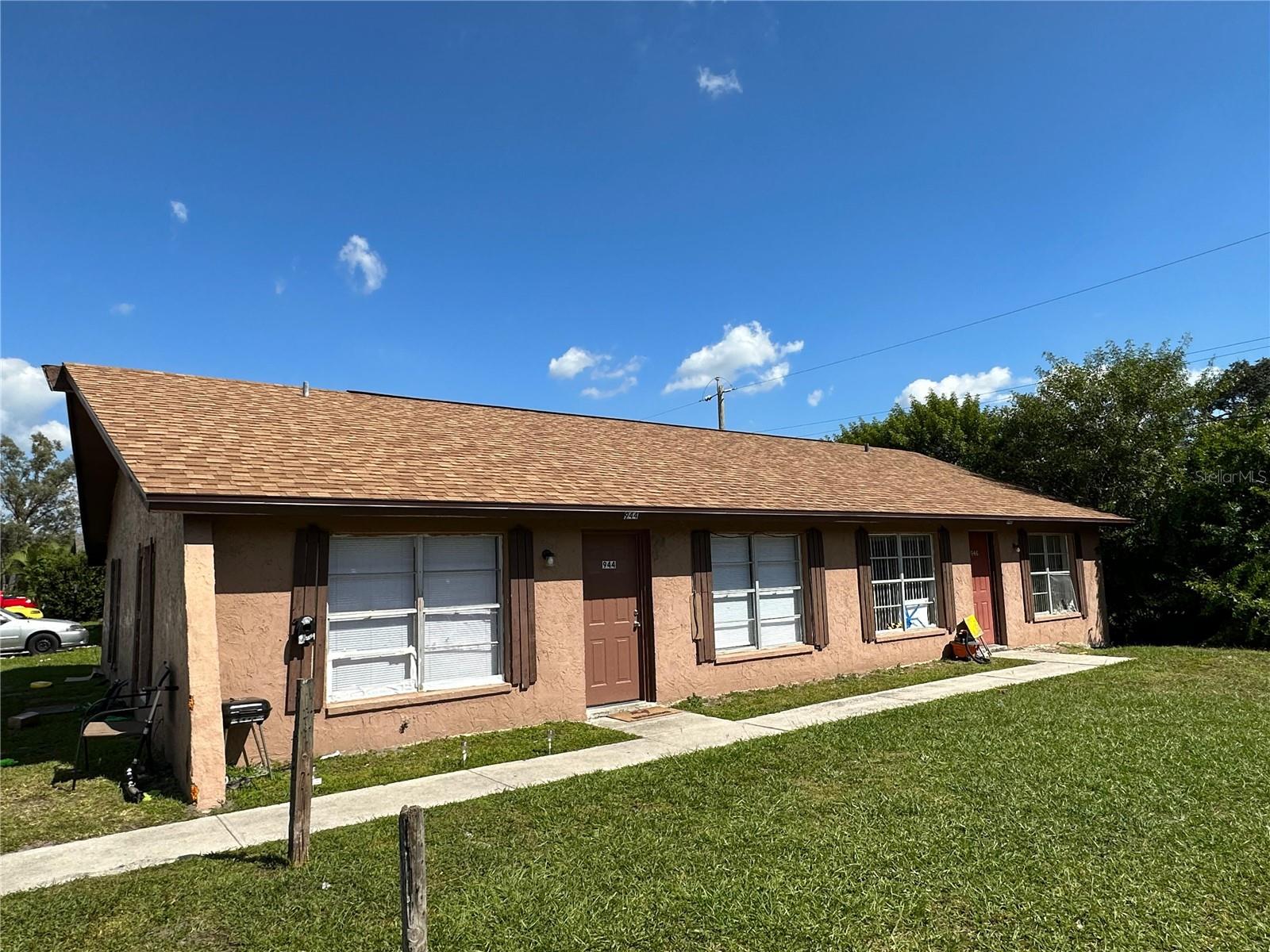 We are delighted to present a fantastic block construction duplex that's sure to catch your eye. This outstanding property boasts two separate units, each offering 2 bedrooms and 1 bathroom, featuring ceramic tile throughout. Roof was replaced within the past year. Currently, Unit 1 rents for just $1,000, and Unit 2 for $1,100, which is below market rent. The potential is truly remarkable, with projected rents of $1,200 to $1,400 for each unit, making this a solid investment opportunity. Perfect for an investor looking to maximize their return or an owner-occupant buyer, who can live in one side and allow the tenant to assist in paying the mortgage. Conveniently located, you'll find yourself just minutes away from the vibrant Lakeland Square Mall, offering a plethora of shopping and dining options. Plus, nearby beautiful Lake Parker Park provides a picturesque setting for outdoor activities, picnics, and relaxation. Don't let this opportunity slip through your fingers. Contact us today to schedule a viewing and uncover the possibilities of owning this hidden gem in Lakeland.