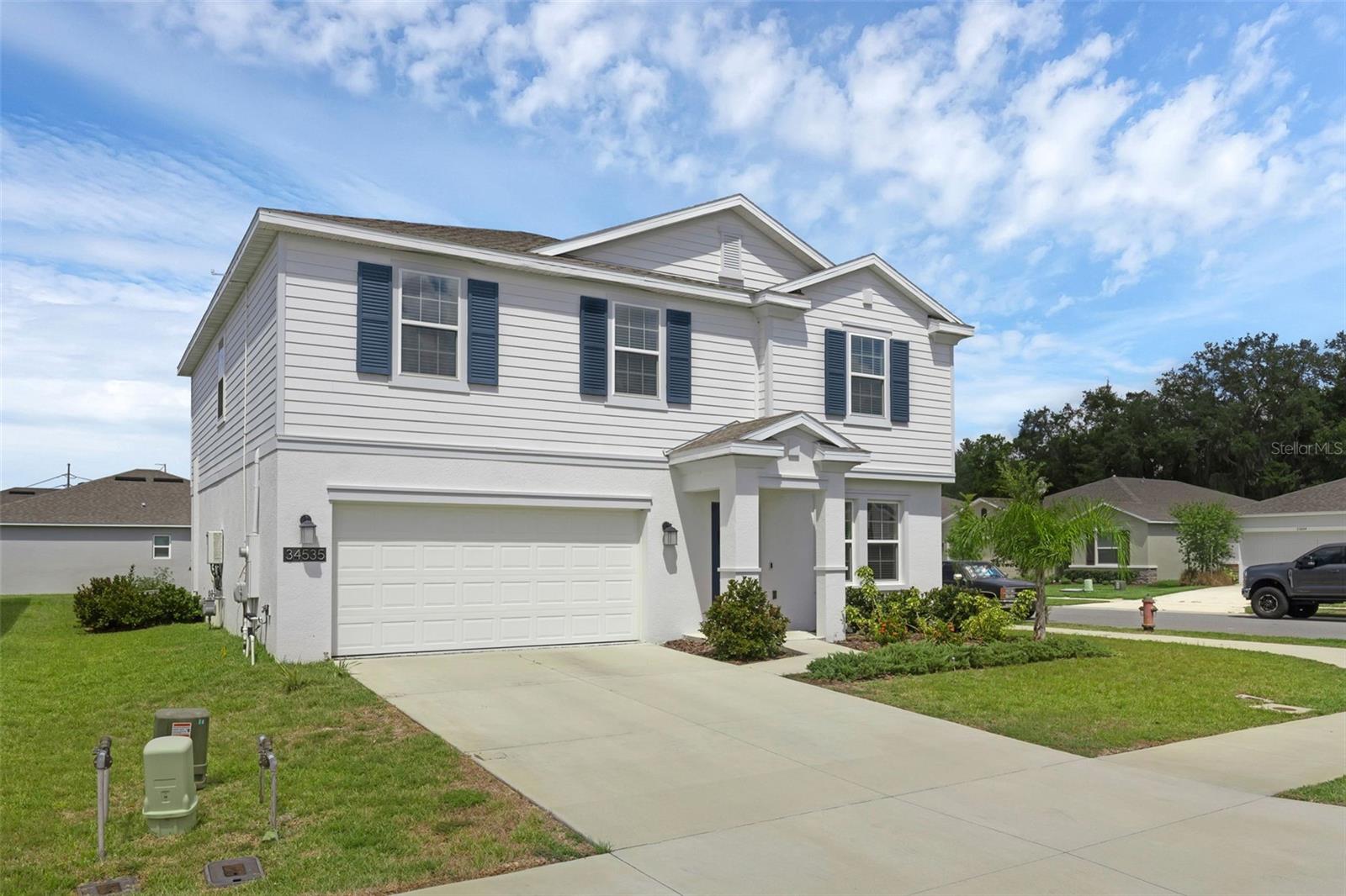 Welcome to this spacious 4-bedroom, 2.5-bathroom two-story home in the desirable Liberty Preserve community of Leesburg. Designed for both comfort and functionality, this residence offers plenty of room to gather, relax, and create lasting memories. Step inside to a bright, open floor plan featuring high ceilings and an expansive living and dining area, perfect for entertaining. The heart of the home is the modern kitchen, complete with a large center island with bar seating, stainless steel appliances, solid surface countertops, oversized tile flooring in wet areas, and a pantry for all your storage needs. A flexible downstairs bonus room provides the perfect space for a home office, playroom, or library. Upstairs, you’ll find all four bedrooms, including a spacious owner’s suite with a walk-in closet and a private ensuite featuring dual sinks and a large shower. The loft adds an additional gathering spot, ideal for movie nights or a cozy reading nook. A conveniently located upstairs laundry room makes daily living a breeze. Outside, the backyard offers plenty of room to enjoy the Florida sunshine—whether for weekend barbecues, playtime, or simply unwinding after a long day. Living in Liberty Preserve means being part of a welcoming community surrounded by natural beauty. Enjoy nearby parks, local gardens, and Venetian Gardens’ bird sanctuary. The location also offers easy access to HWY 44 and HWY 441, the Leesburg Premium Outlets, UF Health Leesburg Hospital, and Leesburg International Airport. This home is move-in ready and offers the perfect balance of space, style, and convenience—come see all that Liberty Preserve has to offer!