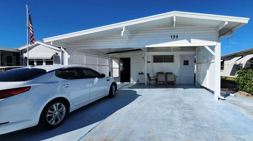 PRICE REDUCED!!! You Own your Land! Fully Furnished 1BR/1BA Mobile Home in the Vibrant 55+ Beautiful Center Crest RV Park Community. Welcome to this charming mobile home that is move-in ready — just bring your suitcase and start enjoying the Florida lifestyle. This home features a kitchen with vinyl flooring, wood cabinets, appliances, cozy breakfast nook with table and chairs, spacious an private 2-car covered carport with decorative latticework on both sides with extra room for your golf cart, convenient in-unit washer and dryer, attached workshop with abundant shelving and cabinets — perfect for hobbies or storage. Enjoy peaceful community living with access to amenities and a welcoming neighborhood atmosphere.  HOA includes sewer, clubhouse, maintenance of heated pool and private streets, library, pool table, bingo nights, exercise classes, pool aerobics, crafts, card games, and much more! Monthly potlucks and fun Wednesday lunches (hot dogs, hamburgers, chips, drinks & ice cream for a small fee). Water and garbage provided and billed separately by the City of Davenport. Don’t miss this opportunity to own land and enjoy an active, social lifestyle in a welcoming 55+ community! Call today to schedule your private showing of this lovely, turn-key home in Center Crest RV Park! Retirement Living at Its Best!