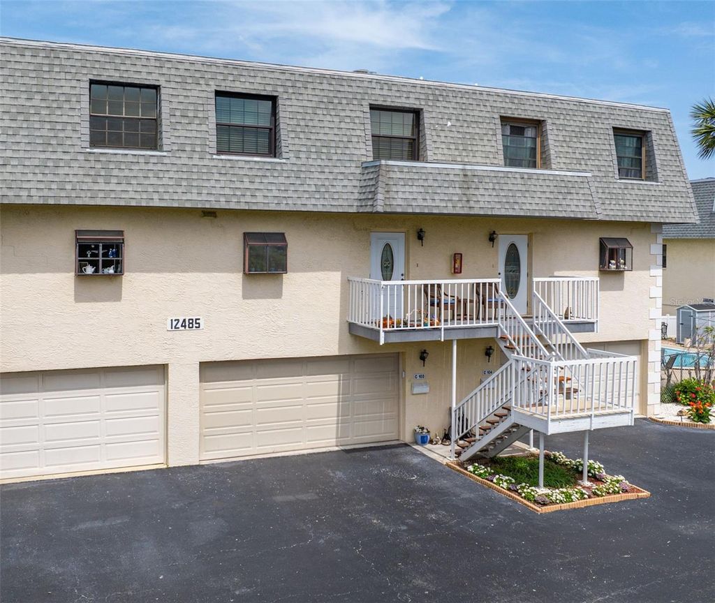 Photo of 12485 2nd Street E #C103, Treasure Island, FL 33706 (MLS # TB8376497)