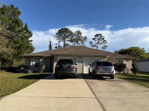 Photo of 6 Pleasant Lane #A/B, Palm Coast, FL 32164 (MLS # FC317079)