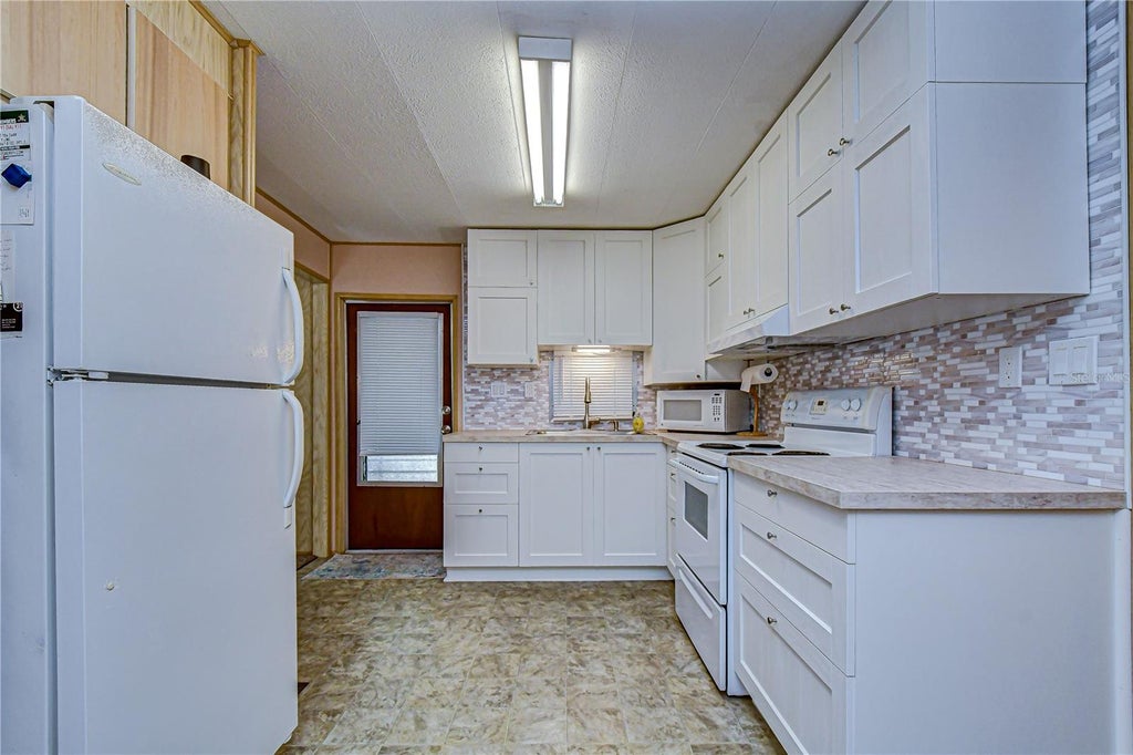 Photo of 6128 Ridgewood Drive, Zephyrhills, FL 33542 (MLS # TB8550689)