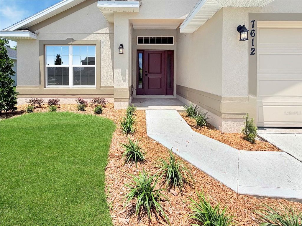 Photo of 7612 Bent Tree Loop, Saint Cloud, FL 34773 (MLS # O6404629)