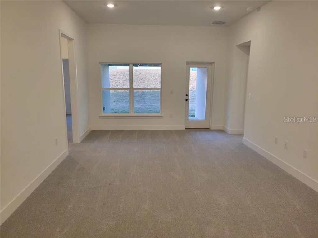 Photo of 7612 Bent Tree Loop, Saint Cloud, FL 34773 (MLS # O6404629)
