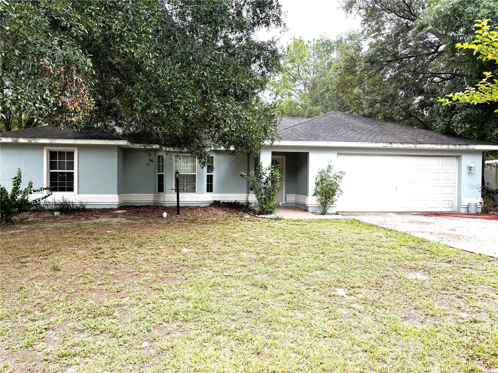 This charming 3-bedrooms, 2-baths home in Silver Springs Shores is tucked away on a quiet cul-de-sac and
walking distance to Florida Greenway trails. Home features a spacious split-bedroom floor plan with almost
1,600sf of living space, vaulted ceilings, tiled floors throughout the home, a large eat-in kitchen with an
abundance of kitchen cabinets. The primary bedroom offers plenty of light and a huge bathroom with a walk-in
shower and a walk-in closet. An inside laundry room, a 2 car garage with garage door opener. Enjoy the nice
fenced backyard with plenty of room for outdoor activities and entertainment. This home with your personal
upgrades and final touches can be your dream home. ROOF WILL BE REPLACED PRIOR TO CLOSING!
Newer HVAC system.