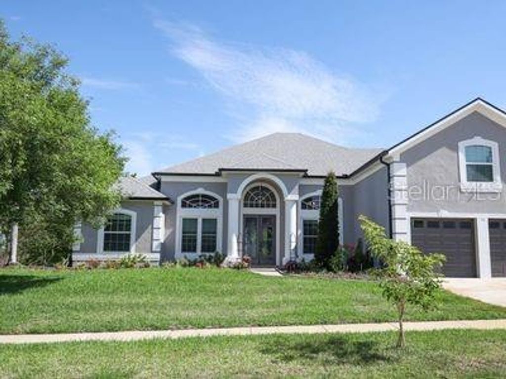 Photo of 16 Oakland Pointe Circle, Oakland, FL 34760 (MLS # TB8513260)
