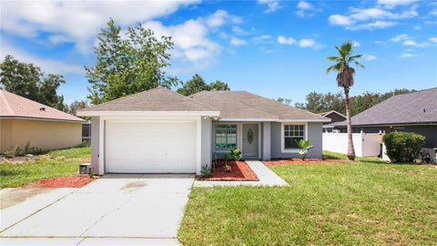 Photo of 318 Walpole Loop, Davenport, FL 33897 (MLS # O6414418)