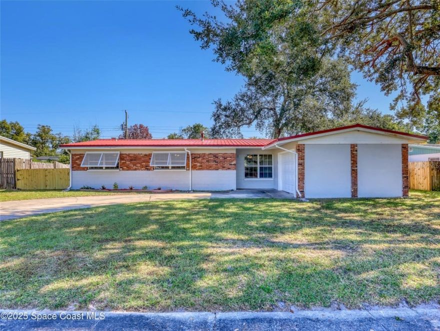 Welcome to your freshly updated 4BED 2 bath home in the heart of Imperial Estates! Step inside this beautiful home and you'll find 2 living spaces, a kitchen that was just updated a few years ago with a GAS stove quartz countertops and solid cabinets. You'll also find 4 bedrooms, a dedicated laundry space and sizeable fenced in back yard with a shed Big tickets items include AC only 2 years old metal roof, TANKLESS water heater only a year old! Every window protected by shutters for peace of mind. New electrical panel just put in! Cosmetic updates include fresh paint, new waterproof vinyl floors, new doors and trim. Close to schools, shopping, parks, Space X, Boeing, Blue Origin and more!