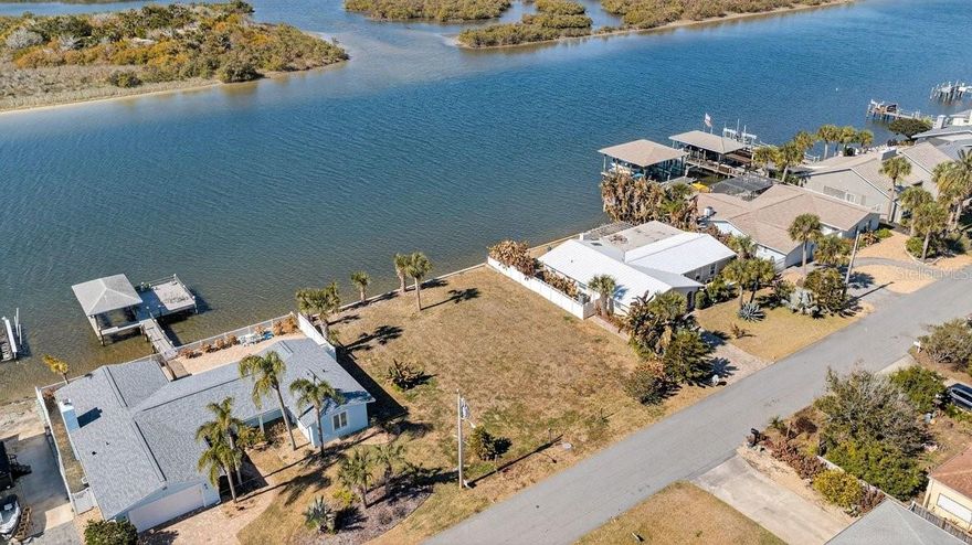 Rare opportunity in Flagler Beach! This is the only vacant lot available in the neighborhood offering 80 feet of deep-water frontage on the Intracoastal Waterway, located directly on the channel—perfect for boating and waterfront living.

The 80’ x 100’ fully cleared lot is build-ready and available only as part of a package with the adjacent home. The seller will not sell the lot prior to the home; however, the home may be sold separately after the home transaction is completed.

When purchased together, the home and lot combine for an impressive 160 feet of Intracoastal frontage, creating a truly exceptional waterfront estate with endless possibilities to build a spacious custom home while enjoying existing riverfront living.

Enjoy the best of both worlds—peaceful riverfront views, deep-water boating access, and the Atlantic Ocean just 3 blocks away in the heart of Flagler Beach. Opportunities like this are extremely limited—secure your slice of Florida waterfront today.