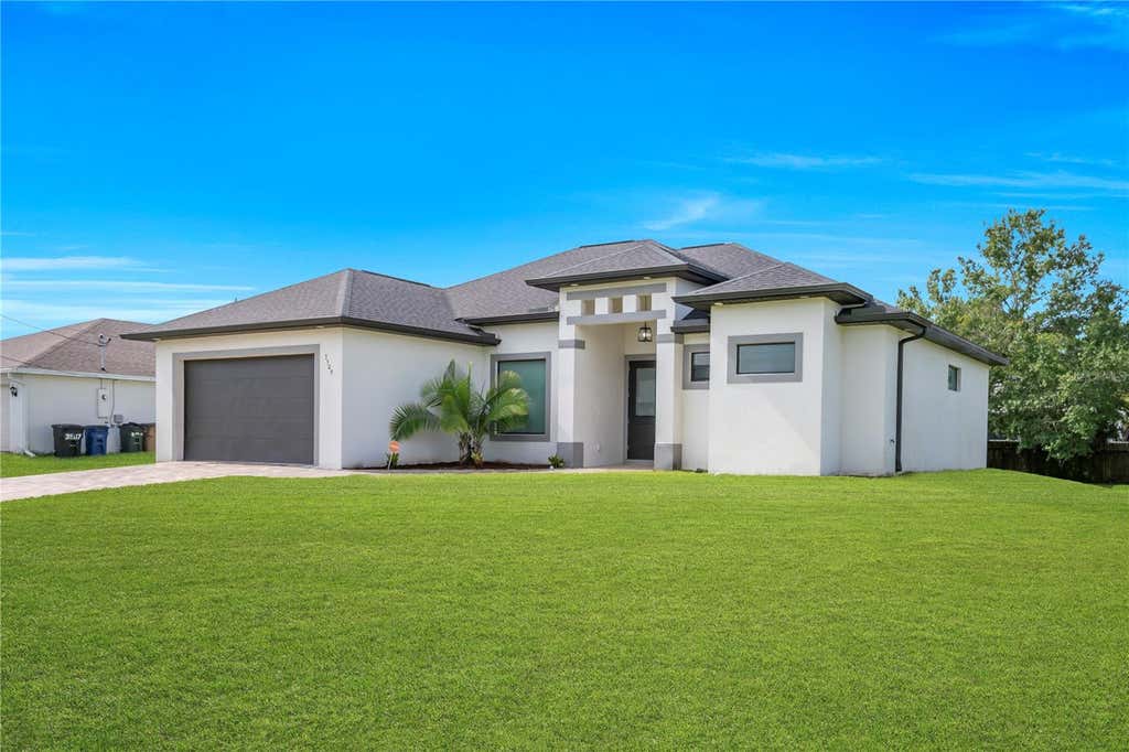 Photo of 3509 38th St SW, Lehigh Acres, FL 33976 (MLS # TB8535736)