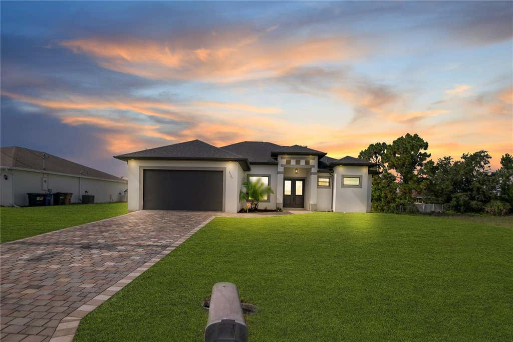 Photo of 3509 38th St SW, Lehigh Acres, FL 33976 (MLS # TB8535736)