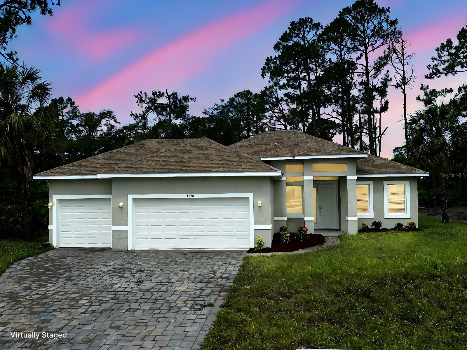 One or more photo(s) has been virtually staged. Brand new construction offering a rare three-car garage in a desirable North Port location. This thoughtfully designed home features 3 bedrooms, 2.5 bathrooms, and a flexible den that can be used as a home office, guest room, or optional fourth bedroom. With 1,839 square feet of living space, the open-concept layout includes a spacious kitchen with a large island, granite countertops, and stainless steel appliances, including refrigerator, range, microwave, dishwasher, and disposal. The primary suite includes a walk-in closet, dual vanities, and a glass-enclosed walk-in shower.
Enjoy 290 square feet of covered outdoor living space on the rear lanai, perfect for everyday enjoyment or entertaining. The front entry features 82 square feet of covered space, adding curb appeal. The 655 square foot three-car garage provides room for parking, storage, or additional flex use. Total constructed area under the roof is 2,866 square feet. A SMART KEY security system is included for added convenience and peace of mind.
Located near local schools, shopping, dining, I-75, and parks. This home is move-in ready and available for immediate occupancy.