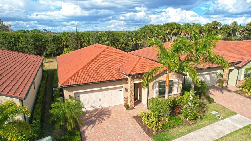 Beautiful single-family home located in desirable gated community of Toscana Isles! This light-filled residence offers 3 bedrooms (office can easily serve as the 3rd bedroom), 2 bathrooms, and a 2-car garage. The spacious open floor plan features an oversized Great Room and numerous windows that make the entire home feel bright and inviting.
The kitchen includes a convenient walk-in pantry, while both bathrooms feature elegant quartz countertops. The primary suite offers two walk-in closets for exceptional storage. The office is equipped with built-in cabinetry and remote color-changing LCD lighting, creating a versatile space for work or guests.
Additional highlights include an inside laundry room, a functional “mud room” with built-in storage (perfect for organizing daily essentials or accommodating a small dog), and a screened lanai with attractive paver flooring overlooking a very private backyard. The home also features a durable tile roof and paver driveway.
Residents enjoy outstanding resort-style amenities including an infinity pool, fitness center, pool table, dog park, bocce courts, pickleball, tennis, and an impressive 8,000-square-foot clubhouse offering a wide variety of daily activities.
Ideally located just minutes from Sarasota Memorial Hospital – North Venice Campus, historic downtown Venice, and pristine Gulf beaches, with easy access to Sarasota-Bradenton International Airport. Don't Miss the 3D Video.