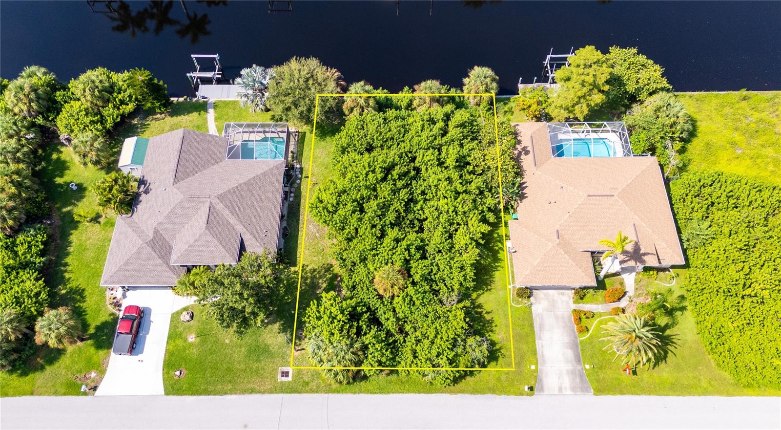 SAILBOAT ACCESS WATERFRONT lot located in Port Charlotte. NO HOA FEES! Perfect for building your DREAM home and living the south Florida lifestyle. Need a builder? Let us introduce you to reputable local builders. Conveniently located near the Edgewater Public Boat Ramp, William R. Gaines Recreation Park, and just minutes from 776, US-41, and Port Charlotte Beach Park. Port Charlotte Beach Park offers sand, sheltered waters, and spectacular sunsets year-round. Amenities include a boardwalk with a fishing pier, boat ramp, canoe/kayak launch, horseshoe pits, bocce courts, basketball courts, tennis courts, volleyball court, playground area, small shelters with picnic tables, two large pavilions, restrooms, heated swimming pool, and a recreation center. Also just a short car ride to the Gulf Beaches of Boca Grande, Englewood, or Manasota Key to name a few where you will find world-class fishing and white sand between your toes. Schedule your showing TODAY!