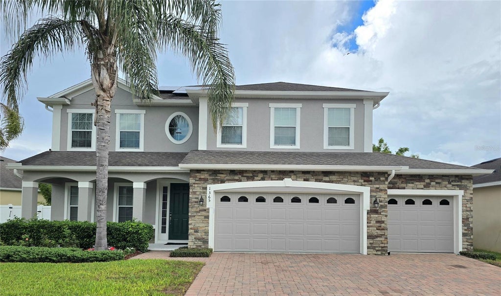 Photo of 1365 Garrett Gilliam Drive, Ocoee, FL 34761 (MLS # O6443087)