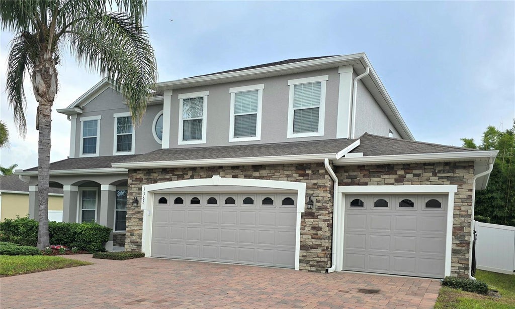 Photo of 1365 Garrett Gilliam Drive, Ocoee, FL 34761 (MLS # O6443087)