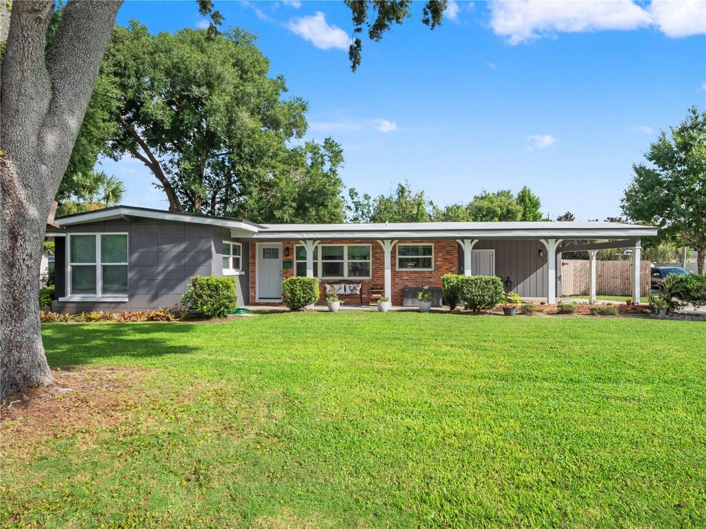 Photo of 1210 Canberra Avenue, Orlando, FL 32806 (MLS # O6445317)