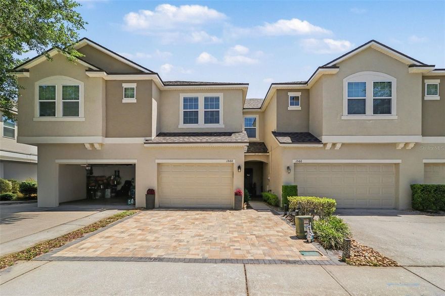 Fall in love at first sight with this charming Oviedo townhome! Enjoy a spacious backyard with mature trees, a serene pond view, and daily wildlife. A brand-new paver driveway fits two cars, with guest parking just steps away. Inside, you'll find a cozy layout with new vinyl flooring downstairs and in upstairs baths. The kitchen features newer stainless steel appliances, granite counters, a pantry, and 42'' cabinets. Relax on the covered, screened patio with an extended paver area--perfect for grilling. Upstairs offers a large primary suite with two walk-in closets and an en suite bath, plus two additional bedrooms, a stylish hall bath, and a separate laundry closet. Roof, exterior paint & HVAC (2023). Community offers a pool and low HOA fees! Ideally located across from the community pool with no front or rear neighbors, and close to UCF, Oviedo on the Park, and 417 for easy commuting.