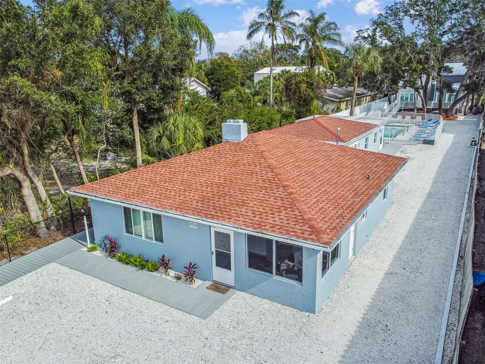 3 Bed/ 1 Bath Fully Furnished Home Available for 2 Night Minimum, Weekly & Monthly Rentals! (Rates vary depending on Season, PLEASE CALL OR TEXT FOR AVAILABILITY) Welcome to the Bayshore Bungalow, one of 6 luxury rentals tucked away within Dunedin Tiny House Vacation Rentals, located right on the Pinellas Trail! The front entrance is conveniently located on Bayshore Blvd just north of the crossroad of Wilson and the back side of property borders the Pinellas Trail. Once you enter the front door of the home you will enjoy a surprisingly private & upscale experience...stocked with everything you'll need to enjoy your vacation or interim time away from home! This unit includes: * LIVING AREA: Comfy Sofa with chaise and ottoman, and a 58" Flat Screen TV; * DINING AREA: Seating with room for 6 at table located in living area. Table can also be used as a desk. Additional seating for 2 in the kitchen; * KITCHEN: Completely stocked with everything you'll need...All kitchen items are newer, not a mishmash of vacation rental leftovers: * BEDROOM 1: Has King size bed; * BEDROOM 2: Has Queen size bed: * BEDROOM 3: Has 2 Twin XL Mattress set up as a bunk bed; * BATHROOM: Tub/Shower Combo with Large Vanity & Linen Closet; * PARKING: 2 Assigned parking spaces on Property in Front Parking Area; EXTRAS INCLUDED WITH OUR BUNGALOW: * Keyless Entry * Beach Towels * Brand New Heated Swimming Pool (Heated when outside temps are 60 Degrees or above) * Private Access to Pinellas Trail * Coin Operated Washer/Dryer located in communal laundry room * Hair Dryer * All Towels & Linens provided. This home share the property with another 1 bedroom cottage and 4 Tiny Homes which all have access to the pool and coin-operated laundry room. This property is Located less than a mile from the heart of Downtown Dunedin & easy walking distance to many restaurants, breweries, shopping & everything Dunedin has to offer.
$5, 000 Off Season (May - October) / $8, 000 In Season (November-April) Fees & Taxes Addl.