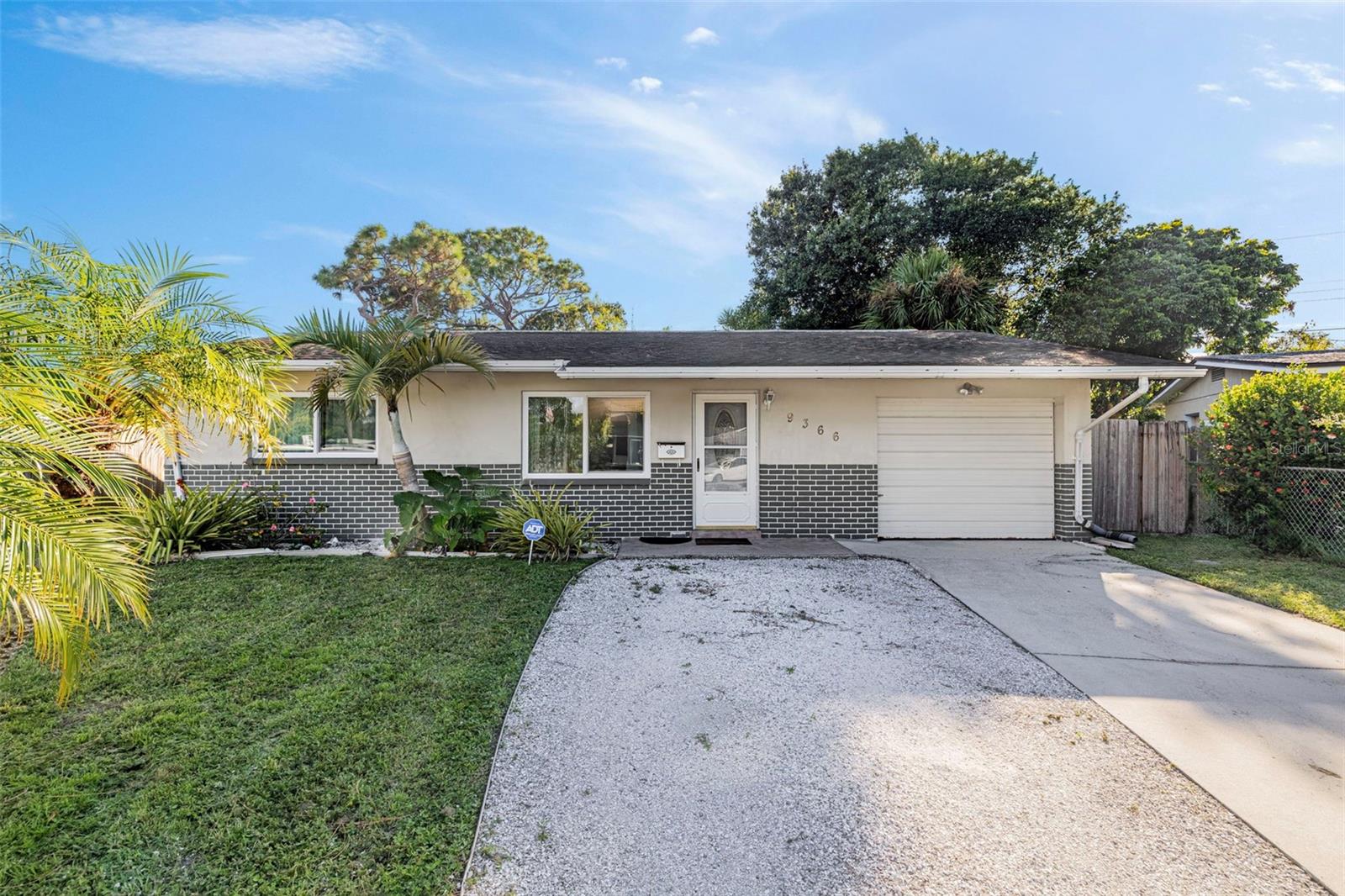 Nestled in the heart of Pinellas County, this move-in ready 2-bedroom, 2-bathroom block home offers the perfect blend of modern updates, versatile living spaces, and an unbeatable location. Whether you’re a first-time buyer or simply looking for a home with room to grow, this property delivers comfort, charm, and functionality.
Step inside to find an open floor plan with an updated kitchen as the centerpiece, featuring sealed travertine countertops, stainless steel appliances, and a breakfast bar for casual dining. A dining room just off the kitchen provides flexibility for family gatherings, hosting events and entertaining.
The thoughtful split floor plan includes a spacious primary suite with tile flooring, an en-suite bath, and a generous sized closet, while the guest bedroom also offers plenty of square footage and the second bathroom showcases a charming double sink vanity and walk in shower. Additional conveniences include an indoor laundry located in the garage with washer/dryer hook-up and extra storage.
Outside, the oversized fenced backyard (nearly 1/4 acre!) is a true highlight, complete with two sheds for storage and space for a garden, a pool and just enough room to park your boat!
Major updates ensure peace of mind, including newer windows (2025), new sliding door (2025), new AC (2023), newer water heater (2019).
Located just minutes from Skyview Recreation Center, local restaurants, shopping, and with easy access to US-19, I-275, Park Blvd, and Bryan Dairy, you’ll enjoy a short drive to Downtown St. Pete, Tampa, and the world-famous beaches.
This unique property is a rare find—offering updates, space, and flexibility in a prime location. Schedule your showing today and discover all the possibilities this home has to offer!