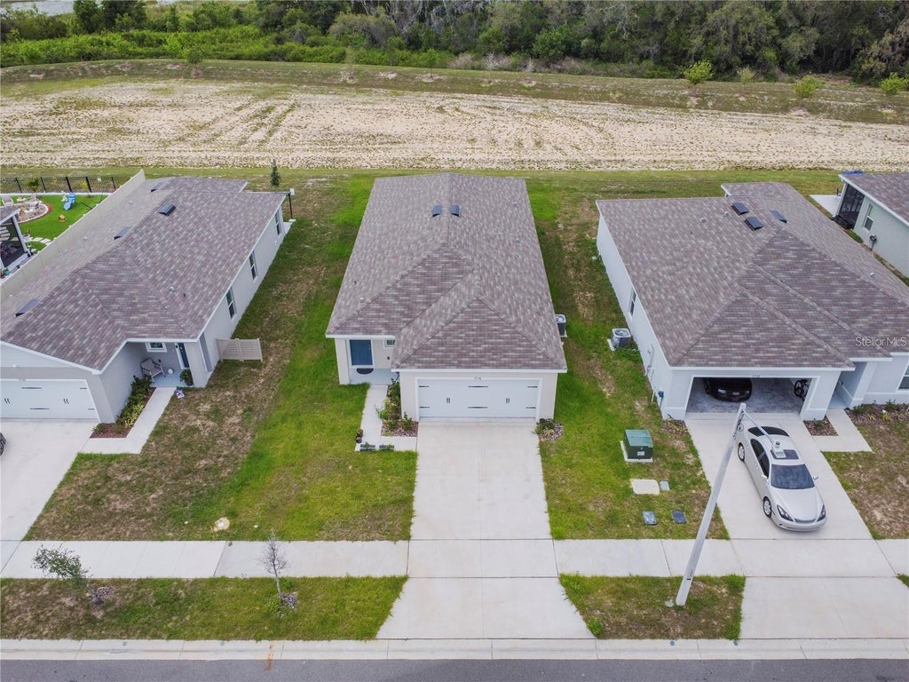 Photo of 5736 Mast Avenue, Haines City, FL 33844 (MLS # O6438313)