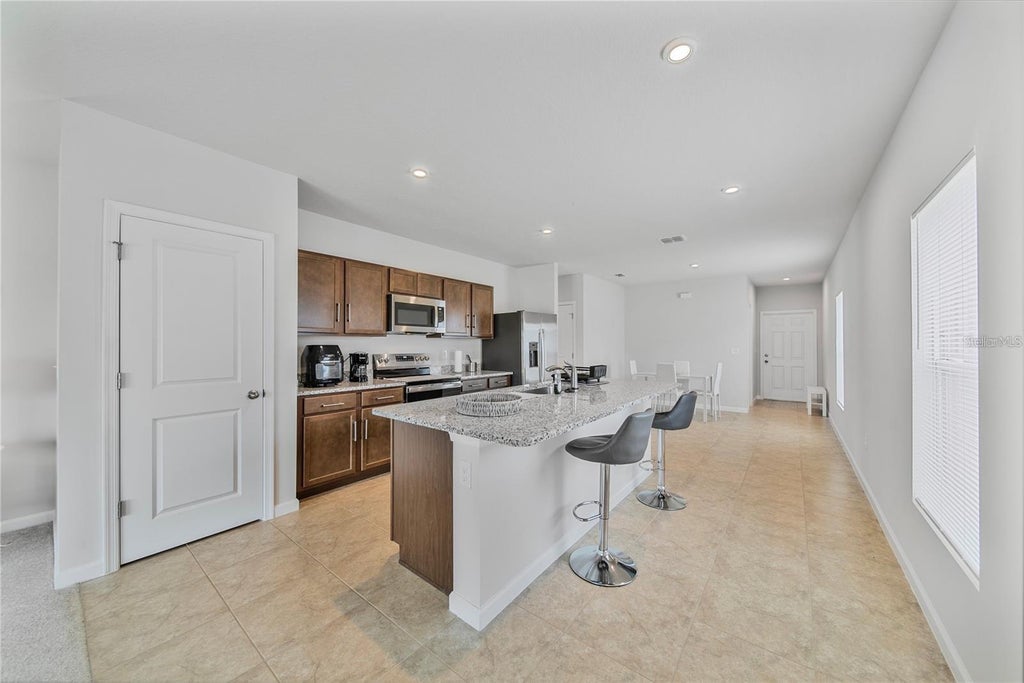 Photo of 5736 Mast Avenue, Haines City, FL 33844 (MLS # O6438313)