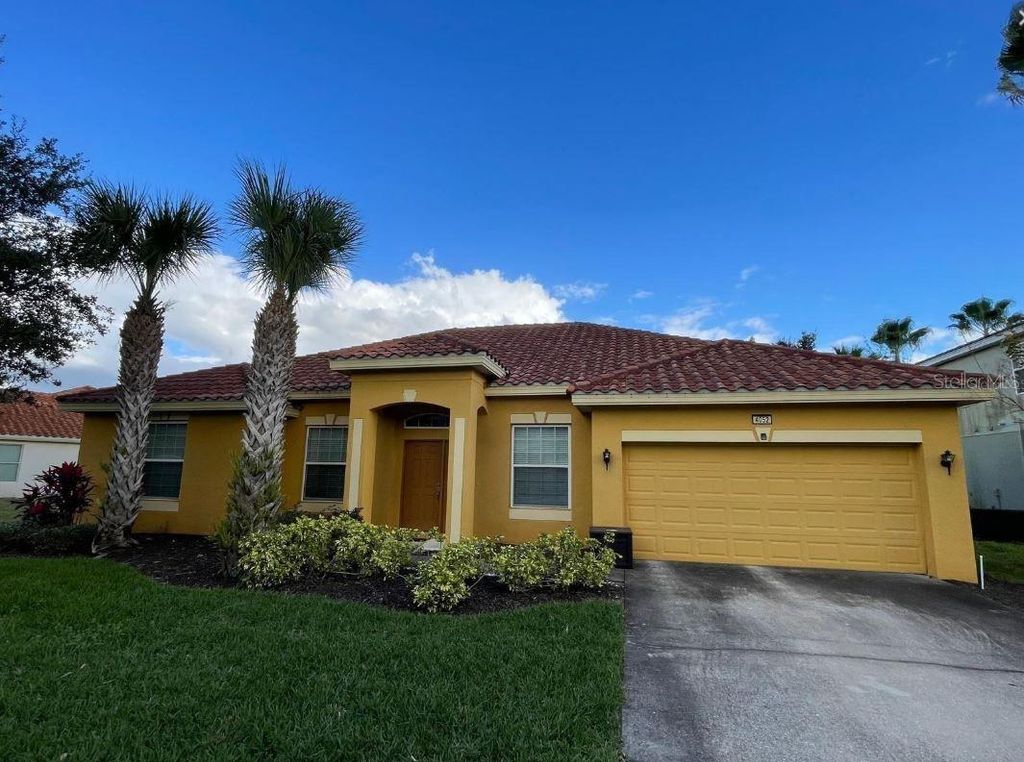Photo of 4052 Oaktree Drive, Davenport, FL 33837 (MLS # O6404021)