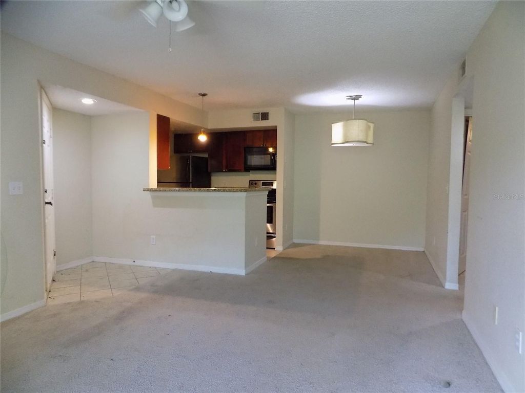 Photo of 5116 Conroy Road #14, Orlando, FL 32811 (MLS # O6411053)