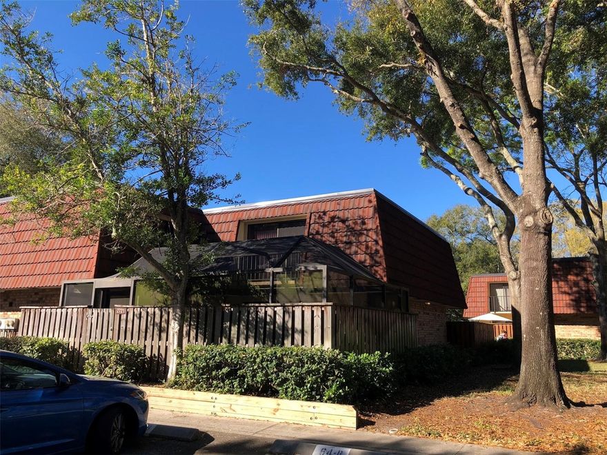 You'll love the winding roads and huge oak trees that line the way back to this UNFURNISHED ANNUAL 2 bedroom, 2.5 bath, 2 story townhome! Enter the private fenced courtyard that is also screened for your year round enjoyment and outdoor dining and entertaining! This townhome has so much to offer! Large living room with sliding doors to the courtyard. Separate dining room with tile floors, lovely chandelier and a mirrored wall that makes the room feel much bigger. The kitchen has top/bottom refrigerator with icemaker, smooth surface range, dishwasher, built in microwave and disposal, lots of cabinets and the breakfast bar to the dining area. There is a half bath downstairs with W/D hookups. Upstairs there are 2 large bedrooms and 2 full baths. The master has a big walk in closet with triple, mirrored sliding doors. The master bath has a walk in shower. Guest bath has tub/shower combo. This amazing townhome INCLUDES THE TRASH AND LAWN SERVICE IN THE RENT. Community features tennis courts, playground and pool!  Please call for your personal tour of this unique home.