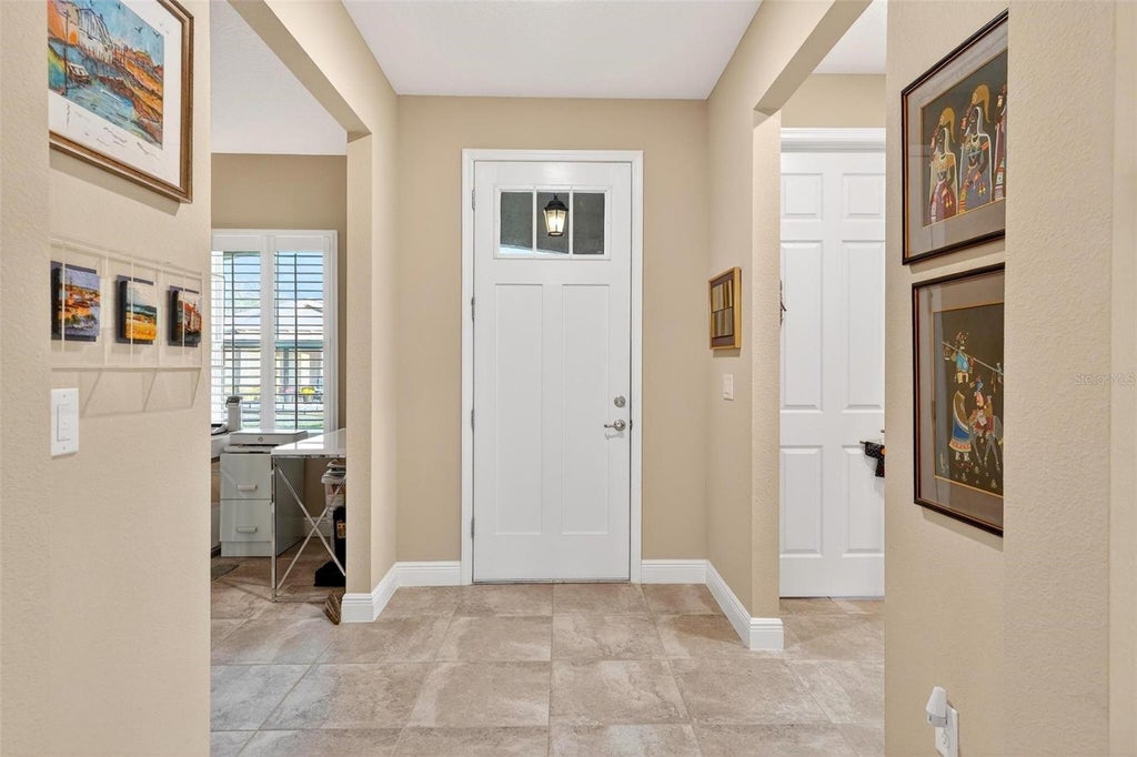 Photo of 10327 SW 96th Loop, Ocala, FL 34481 (MLS # OM731985)