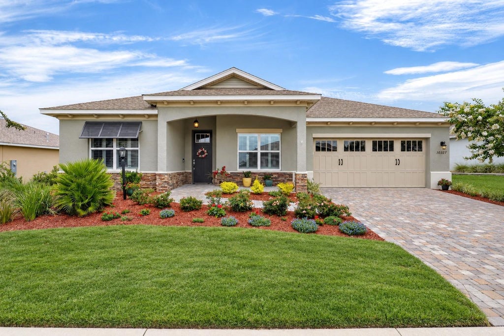 Photo of 10327 SW 96th Loop, Ocala, FL 34481 (MLS # OM731985)
