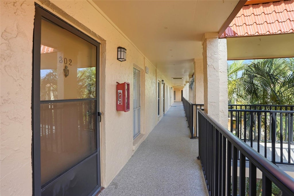 Photo of 8911 Blind Pass Road #302, St Pete Beach, FL 33706 (MLS # TB8516676)