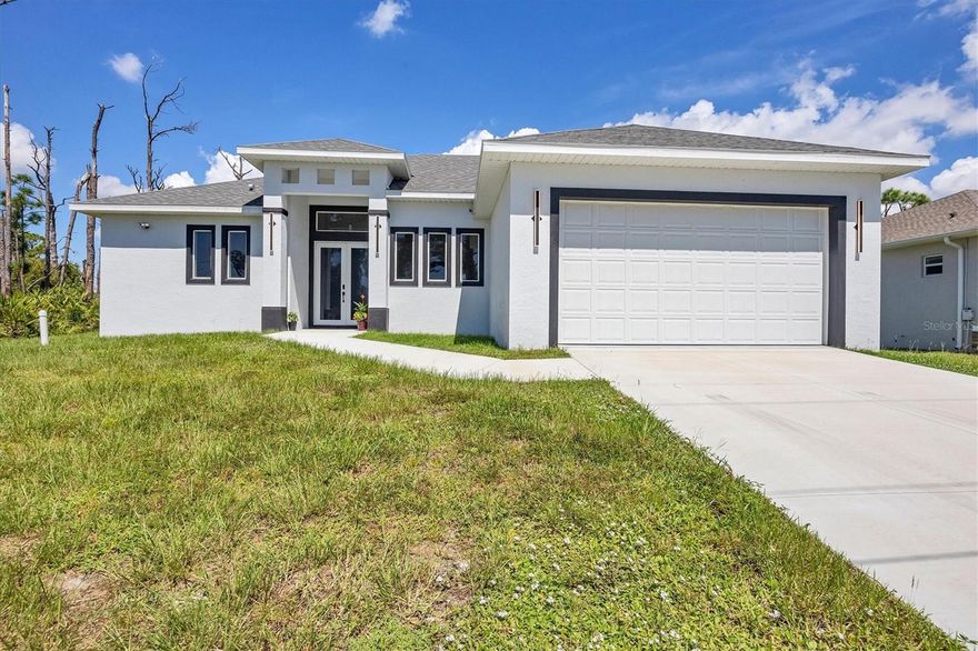 New construction home in Rotonda Meadows, designed with modern style and everyday comfort in mind. This one-story residence offers 3 bedrooms, 2.5 bathrooms, a versatile den, and a private pool—ideal for both entertaining and relaxation.
The primary suite features a spacious walk-in closet and a spa-inspired bath with dual sinks and a walk-in shower. The open-concept kitchen includes a quartz waterfall island, premium appliances, and flows seamlessly into the main living area. Throughout the home, luxury vinyl plank flooring adds durability and style. A den provides flexible space for a home office or creative retreat.
Step outside to your private pool set on a paver deck, with a convenient half bath on the patio. The outdoor kitchen area is fully prepped and ready to be finished to your taste.
Additional highlights include impact-resistant windows, high ceilings, and elegant finishes that bring comfort and sophistication together. The lot directly behind the home is also available for purchase separately or together, creating an expanded opportunity and view of the lake
This popular community is in a relatively quiet part of town away from the hustle and bustle, yet just minutes from great shopping, dining, several golf courses, and the pristine Gulf beaches. Sports fans will enjoy the short drive to two spring training camps. Near the biking and walking trails and waterways. Ready for immediate enjoyment, this home is the perfect blend of style, quality, and function. Don’t miss this rare opportunity to own an exceptional home in paradise!