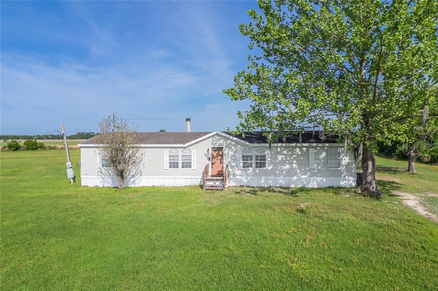 This 3 acre property has 3 bedrooms, 2 bath, a renovated kitchen with granite counter top and new appliances. With an open living space and a beautiful fire place, you and your family will love this spacious home! No HOA and plenty of space on the property for possibly keeping animals or starting a family farm. The property comes with salt filtered well for your water needs and renovated septic tank. The roof is only 5 years old. Ideally located in a quiet, rural setting, this property offers privacy while still being conveniently close to major roadways including Highway 33 and I-4.