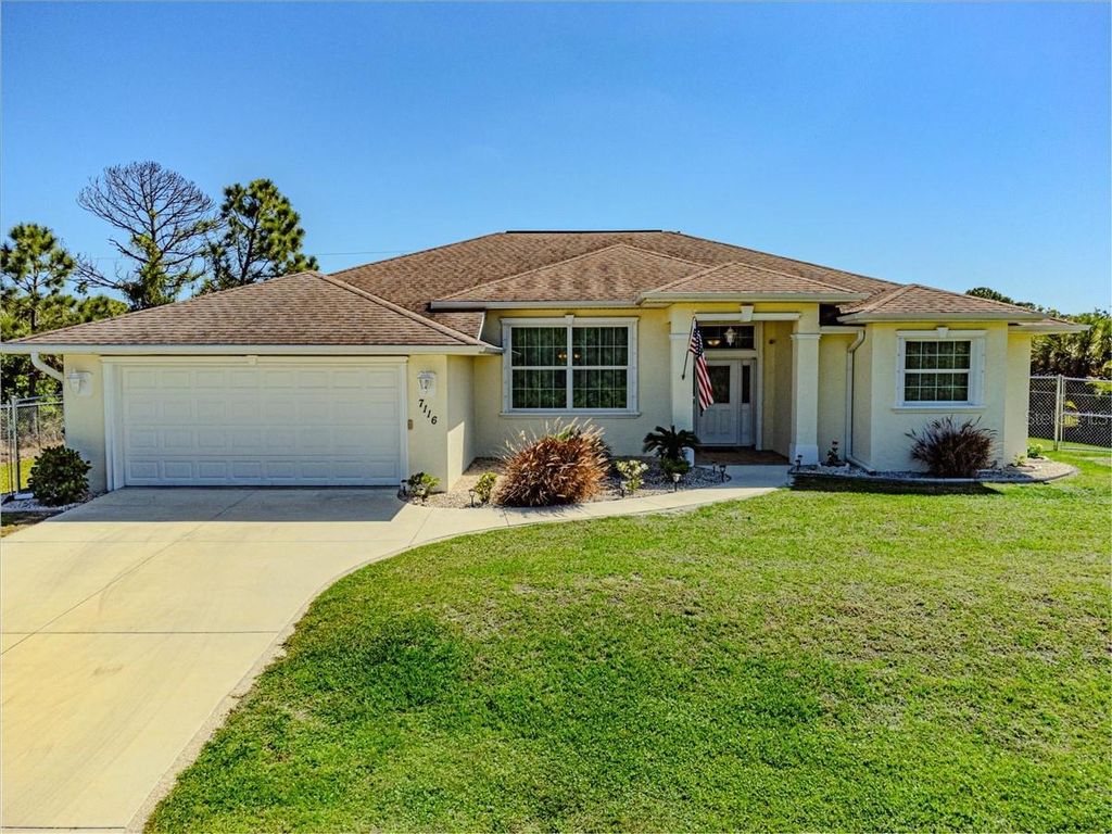 Photo of 7116 Quigley Street, Englewood, FL 34224 (MLS # C7522010)