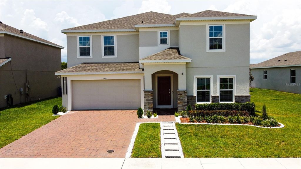 Photo of 1588 Sky Lakes Drive, Saint Cloud, FL 34769 (MLS # O6321058)