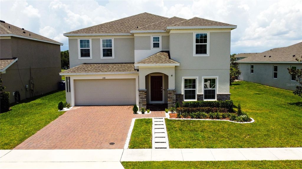 Photo of 1588 Sky Lakes Drive, Saint Cloud, FL 34769 (MLS # O6321058)